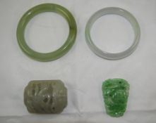 Two Various Jade Bangles plus a belt ornament and pendant,