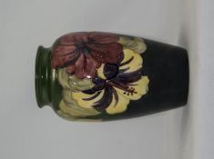W. Moorcroft Signed Vase ' Hibiscus ' Design with Pink and Yellow Flowers on Green Ground. Signed to
