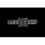 Ladies 18ct White Gold Diamond Set Ring. The Four Central Set Diamonds, Flanked by a Further 8