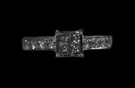 Ladies 18ct White Gold Diamond Set Ring. The Four Central Set Diamonds, Flanked by a Further 8