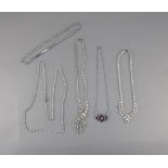 Four Various Clear Crystal Necklaces plus one with purple crystals(5)