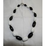 Monochrome Agate Large Stone Necklace comprising alternate, graduated, whlte and black agate, cuboid