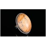 Picture Jasper Ring, a 35ct oval cut cabochon of natural picture jasper, bezel set in silver with