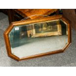 1920's Oak Framed Mahogany Mirror, with bevelled glass and measuring 29 by 18 inches.