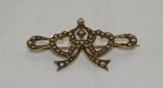 Victorian Gold Sweetheart brooch The Front In The Form Of 2 Hearts In Entwined Bow Set With Seed