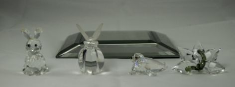 Swarovski Crystal Figurines ( 4 ) In Total. 1/ Rabbit, 2/ Butterfly on a Bottle. 3/ Flower. 4/ Seal.