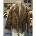 Ladies Short Blonde Mink Jacket. Fully lined with hook and eye fastening and slit pockets. approx