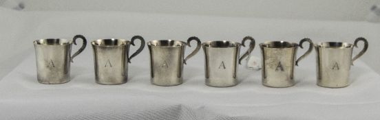 Swedish Retro Silver Set of Six Drinking Cups of Plain Form with Scroll Handles.