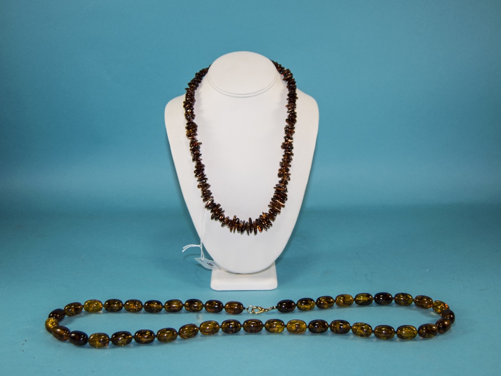 A Vintage Pair of Bead Necklaces. Lengths 35 and 22 Inches.
