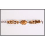 Picture Jasper Bracelet, a large oval cut, bezel set cabochon of picture jasper attached to a double