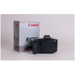 Canon EOS-620 Camera. As new condition with strap. Made 1987-1988. Complete with box and papers.