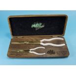 Mac Limited Cased Limited Edition Tools containing two sets of gold plated tongs
