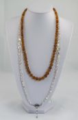 A Vintage Amber Bead Necklace of 24 Inch