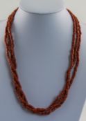 A Triple Strand Coral Necklace, Maximum