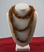 A Vintage - Hand Crafted Coral Chips Necklace. 78 Inches In Length.