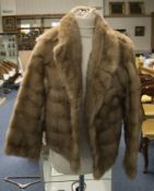 Ladies Short Blonde Mink Jacket. Fully lined with hook and eye fastening and slit pockets. approx