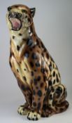 A Large and Realistic Hand Painted Ceramic Figure of a Leopard In a Sitting Position Growling.