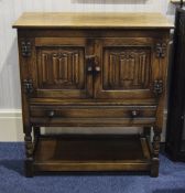 Priory Style Oak Sideboard, Comprising Central Cupboard with Linen Fold Mouldings on Doors.