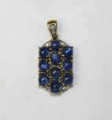 9ct Gold Cabochon Cut Sapphire Pendant / Drop, Set with 10 Sapphires and Diamond Spacers.