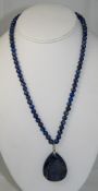 A Lapis Lazuli Beaded Necklace with Silver Lapis Lazuli, Heart Shaped Pendant Drop.