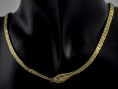 A Vintage and Fine 9ct Gold - Snakes Head Necklace, The Snake with Ruby Set Eyes.