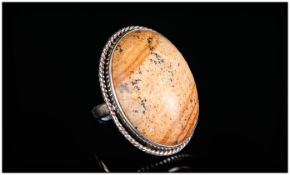Picture Jasper Ring, a 35ct oval cut cabochon of natural picture jasper, bezel set in silver with