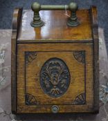 Victorian Oak Coal Scuttle with Brass Handle and Carved Panel Lift up Door.