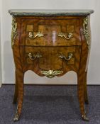 A Louis XV Style Kingwood Cross banded and Ormolu Mounted Bombe Petite Commode.