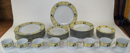 Modern Teaset, yellow colouring with tulip decoration. Dishwasher and microwave safe.