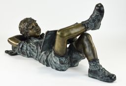 A Fine Quality 20th Century Impressive Bronze Figure of a Young School Boy Lying Down,