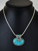 A Nice Quality Arts & Crafts Style Large Silver and Turquoise Set Drop Pendant with Attached Silver