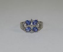 Ladies Silver Set Tanzanite Cluster Ring. Ring Size ' O ' Tanzanite's of Good Colour.