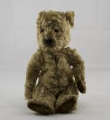 A 1920's / 1930's Mohair Teddy Bear, Straw Filled, Glass Eyes, Black Stitched Nose and Mouth. Well