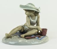 Lladro Figure "Sandcastles" Model Number 5488. Sculpted By Regino Torrijos. Issued 1988-1992.