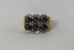 9ct Gold Set Cabochon Cut Sapphires and Diamond Cluster Ring.