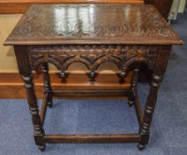 Small Oak Carved Occasional Table, with Turned Column Legs Terminating on Caster Feet. Height 27.