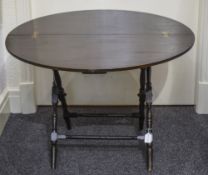 A Mahogany Campaign Table by Thornton &