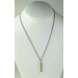 9ct White Gold Textured Oblong Pendant Suspended On A 9ct White Gold Chain,
