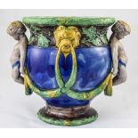 A 19th Century Majolica Jardiniere with Moulded Cherubs and Lion Masks. c.1870. Lozenge to