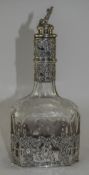 A Very Fine German - Late 19th Century Silver Mounted and Applied Etched Glass Decanter. The Figural