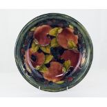 William Moorcroft Tube lined Shallow Bowl - Ochre Pomegranate Design. Date 1914. 8.75 Inches