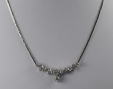 14ct White Gold Diamond Necklace Set With 6 Round Brilliant Cut Diamonds Between 5 Diamond Clusters
