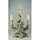 A German Late 19th Century Hand Painted Porcelain Figural 3 Branch Candelabra, The Central Venus