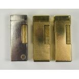 Dunhill Gold Plated and Vintage Petrol Lighters ( 3 ) In Total. British and USA Registration.