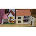 Two Early To Mid 20th Century Wooden Dolls Houses. The Largest 19 Inches High, 20 x 14 Inches.