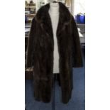 Ladies Brown Three Quarter Length Mink Coat, with three quarter length sleeves.