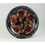 William Moorcroft Signed Shallow Dish, Pomegranates and Berries Design on Bluey Ground. c.1920. 8.