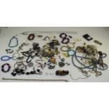 2 Bags Containing A Collection Of Beads, Necklaces, Bracelets,