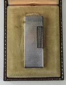 Dunhill Silver Cased Petrol Lighter with Original Box. U.S. Reg 24153. 2.5 Inches High.