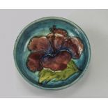 Moorcroft Small Footed Bowl ' Hibiscus ' Design on Bluey Ground.